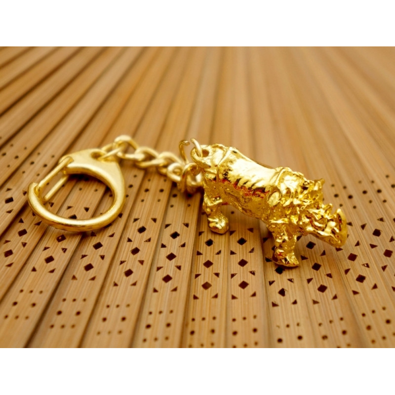 Брелок у золотому кольорі Символи Фен Шуй Носоріг