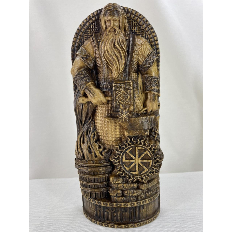 Статуетка слов“янського бога Сварог великий дерево