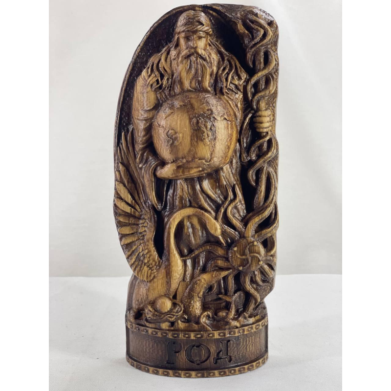 Статуетка слов“янського бога Рід велика дерево