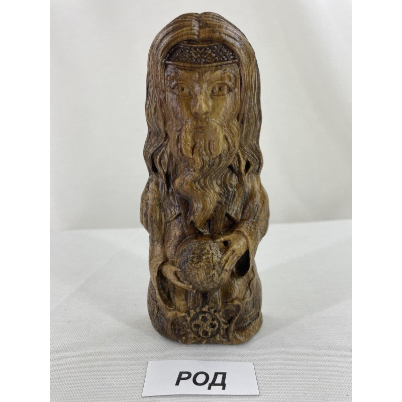Статуетка слов“янського бога Рід мала дерево