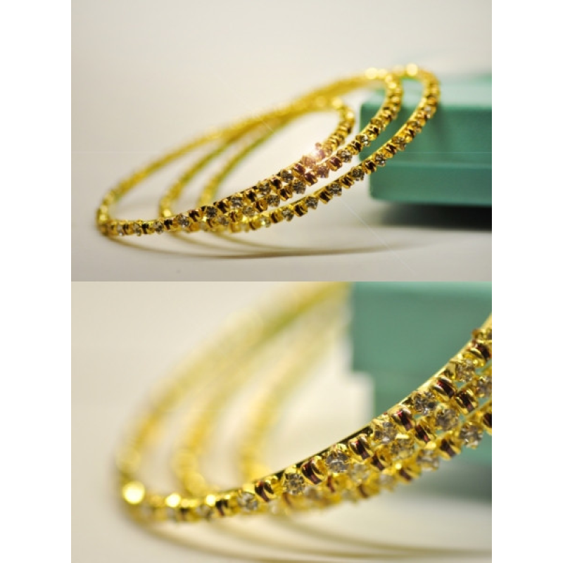 Браслет жовтий метал під золото зі стразами