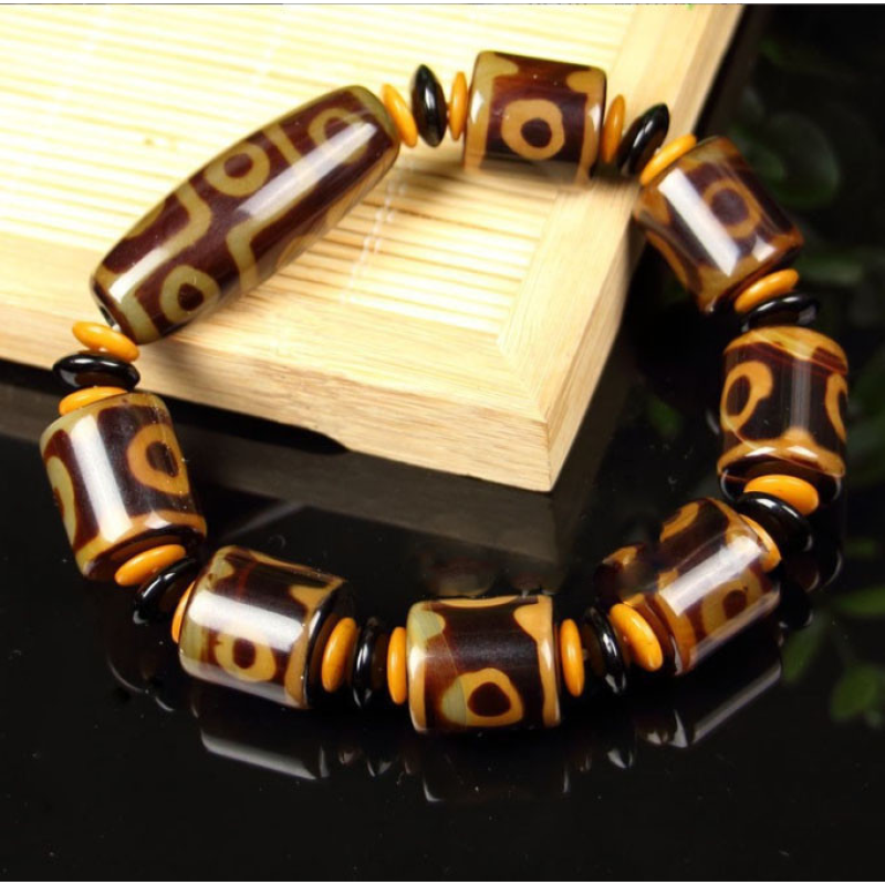 Браслет Коричнева ДЗІ 9 очей і сім на 3 ока