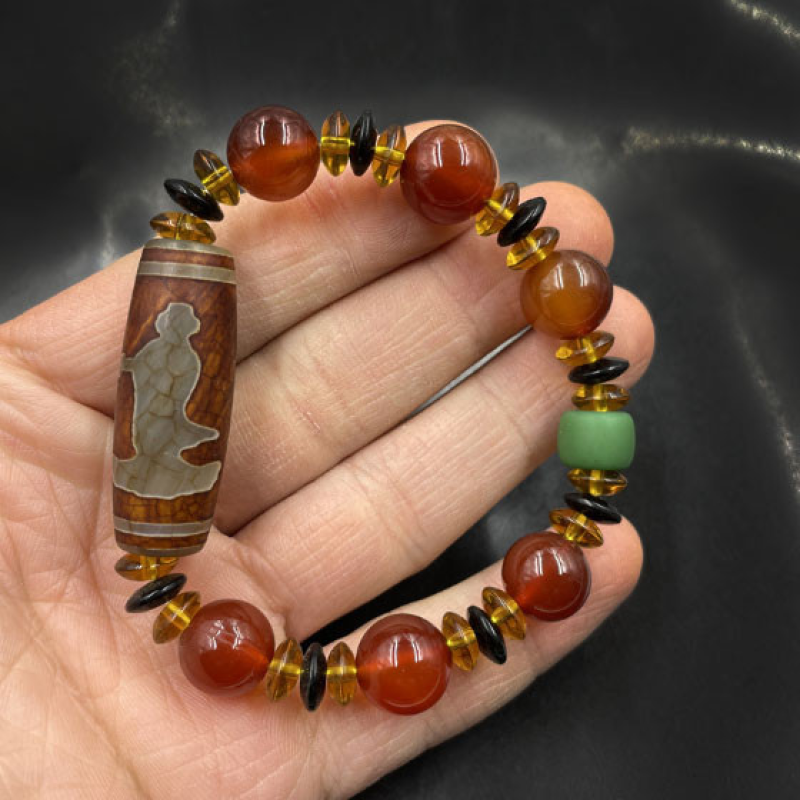 Браслет ДЗІ Гуань Інь з червоним агатом Браслет ДЗІ Гуань Інь з червоним агатом