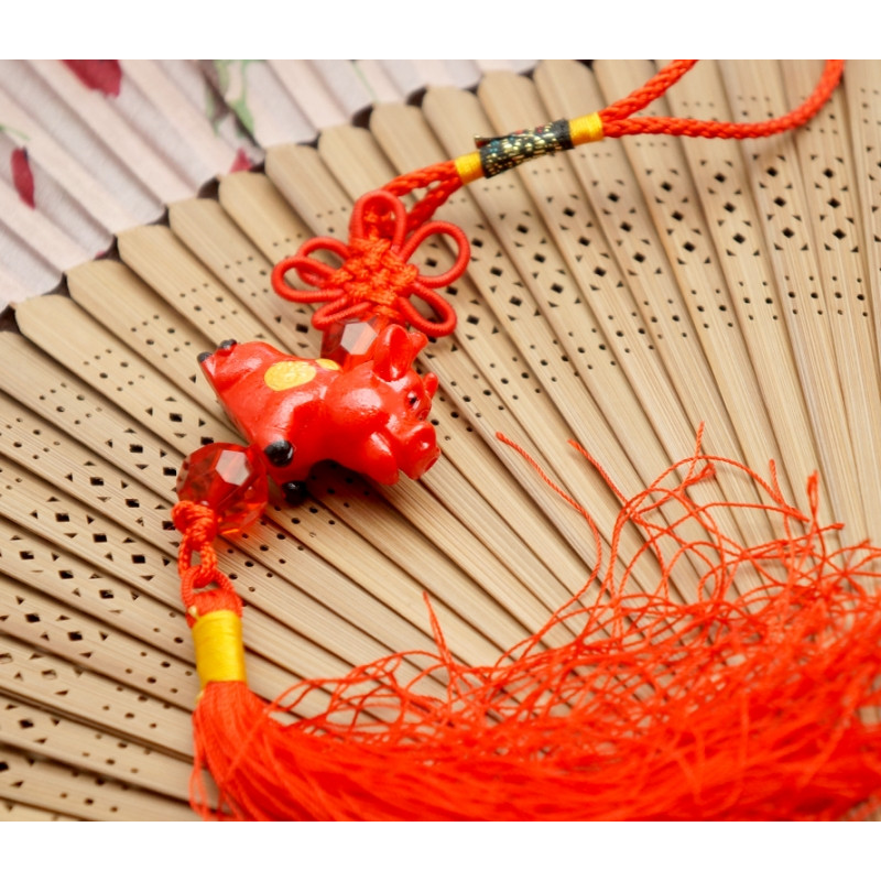 Підвіска з пензликом Бик червоний